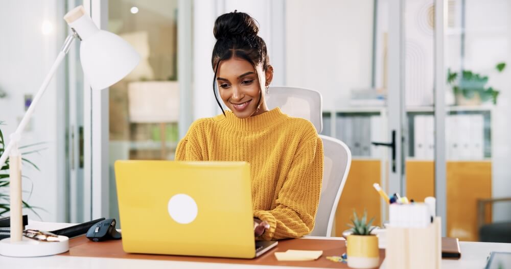 A healthcare provider reviewing reduced operational costs after switching to virtual medical scribe services.