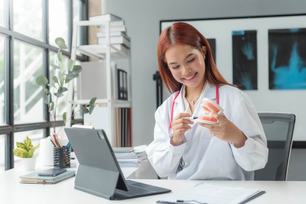 Dental virtual assistant guiding about different parts of periodontium to a patient on remote followup.