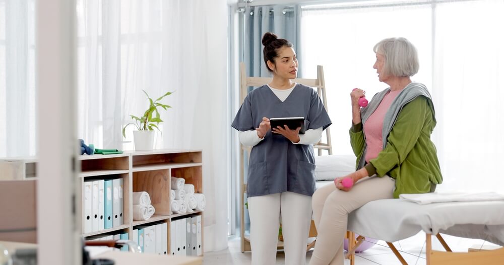 Chiropractic Assistant following up with an old woman