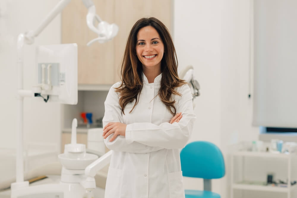 Medical clinic examination room where medical assistants support physicians and patient care.